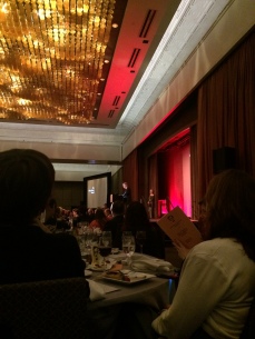 View from the Dell table of Stephen King presenting the Ellery Queen Award to Charles Ardai